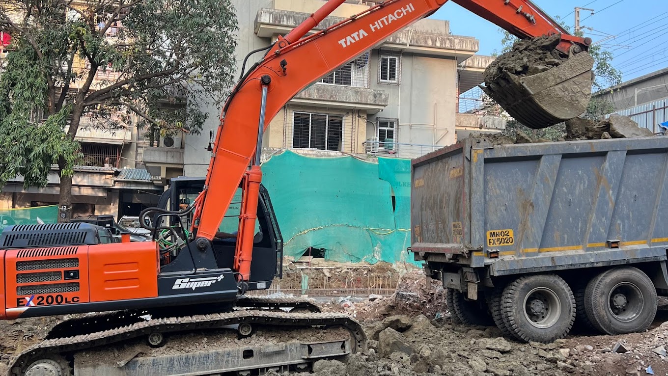 Tata Hitachi excavator loading truck